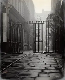 The church of St Bartholomew the Great and surrounding area; iron gates leading to..., 1909 Creator: GW Miller