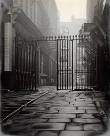 The church of St Bartholomew the Great and surrounding area; iron gates leading to..., 1909 Creator: GW Miller