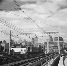The city of San Francisco, California, seen from the first street ramp of Oakland Bay Bridge, 1939. Creator: Dorothea Lange