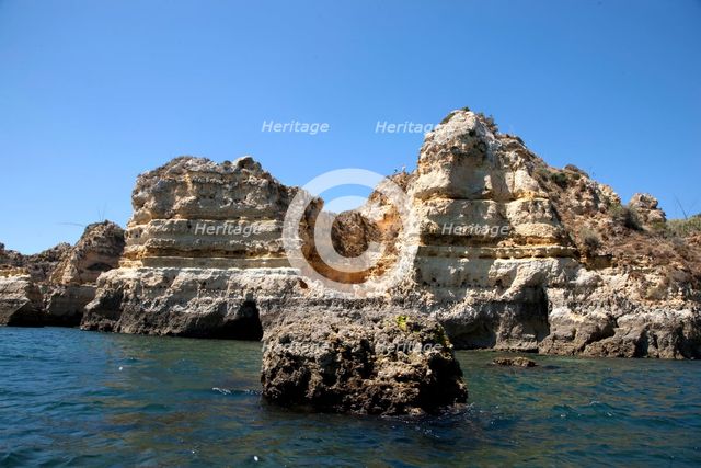 The cliffs at Praia de Dona Ana, Portugal, 2009. Creator: Samuel Magal.