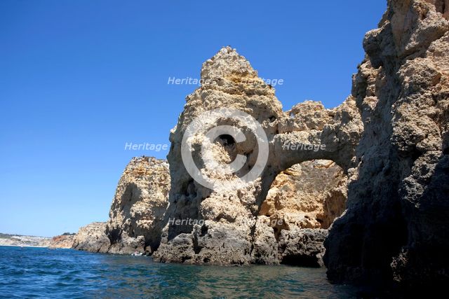 The cliffs at Praia de Dona Ana, Portugal, 2009. Creator: Samuel Magal.