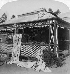 The Club which was struck by a 94lb Boer shell, siege of Mafeking, South Africa, 1901. Creator: Underwood & Underwood