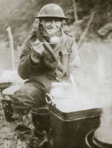 The cook saves a large one for himself Somme campaign, France, World War I, 1916. Creator: Unknown