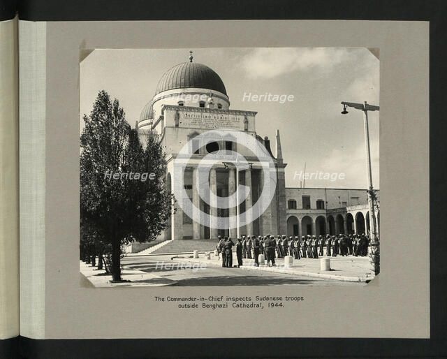 The Commander-in-Chief inspect Sudanese troops outside Benghazi Cathedral, 1944. Creators: Colonial Office, Unknown.