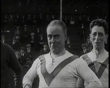 The Comedian George Robey Pulling Faces On a Football Pitch in Front of a Large Crowd, 1920s. Creator: British Pathe Ltd