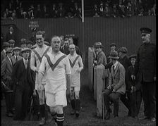 The Comedian George Robey Running Out Onto a Football Pitch in Front of a Large Crowd, 1920s. Creator: British Pathe Ltd