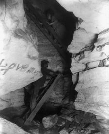 "The Corkscrew" (narrow upward passage), Mammoth Cave, Edmondson County, Kentucky, c1891. Creator: Frances Benjamin Johnston