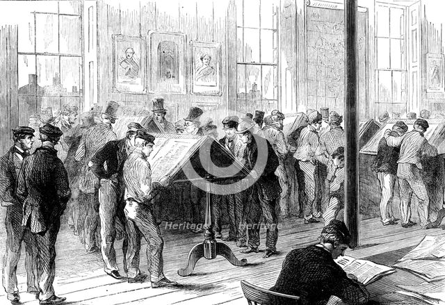 The Cotton Famine: operatives reading the latest news from America in Camp-field free library, 1862 Creator: Unknown.