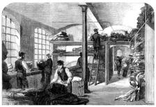 The Cotton Famine: receiving clothes at Bridewell Hospital...for the distressed operatives, 1862. Creator: Unknown