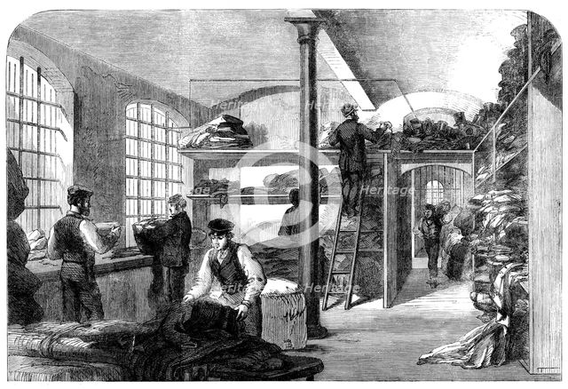 The Cotton Famine: receiving clothes at Bridewell Hospital...for the distressed operatives, 1862. Creator: Unknown.