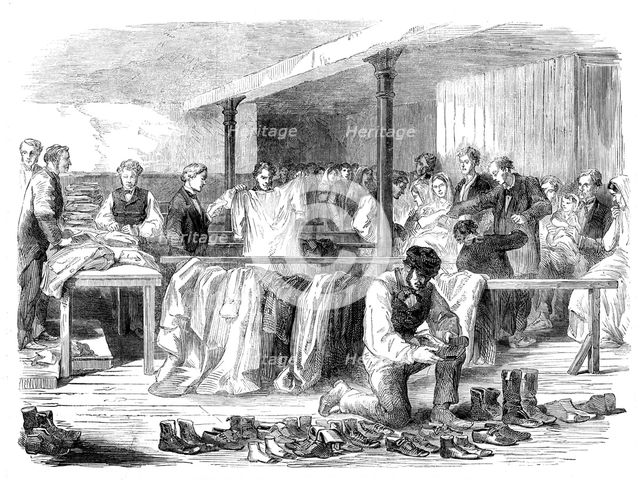 The Cotton Famine: the Manchester and Salford Provident Society distributing clothing, 1862. Creator: Unknown.