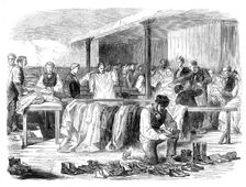 The Cotton Famine: the Manchester and Salford Provident Society distributing clothing, 1862. Creator: Unknown