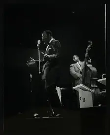 The Count Basie Orchestra in concert at Colston Hall, Bristol, 1957. Creator: Denis Williams
