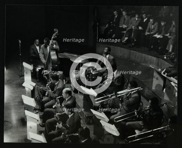 The Count Basie Orchestra in concert at Colston Hall, Bristol, 1957. Artist: Denis Williams