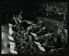 The Count Basie Orchestra in concert at Colston Hall, Bristol, 1957. Artist: Denis Williams