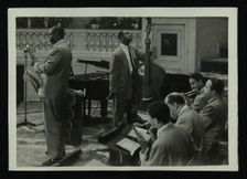 The Count Basie Orchestra in concert, c1950s. Creator: Denis Williams