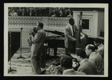 The Count Basie Orchestra in concert, c1950s. Creator: Denis Williams