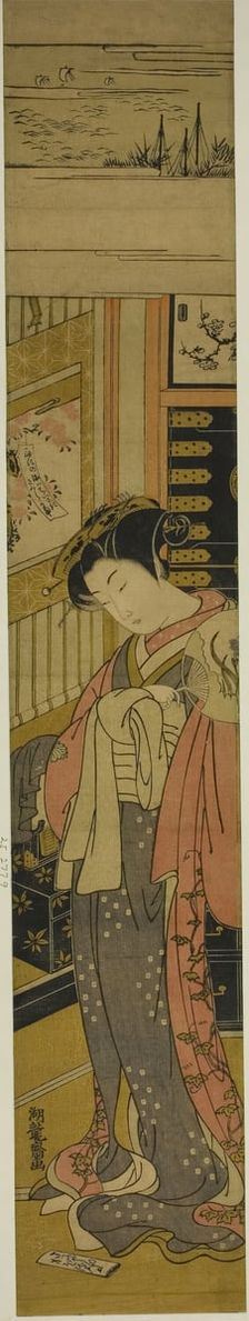 The Courtesan Kaoru of Chojiya Looking Down at a Love Letter on the Floor, c. 1773/75. Creator: Isoda Koryusai