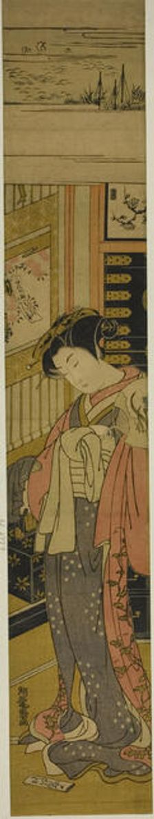 The Courtesan Kaoru of Chojiya Looking Down at a Love Letter on the Floor, c. 1773/75. Creator: Isoda Koryusai