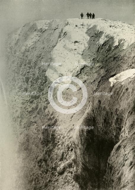 'The Crater of Erebus, 900 Feet Deep and Half A Mile Wide', 1908, (1909).  Artist: Unknown.