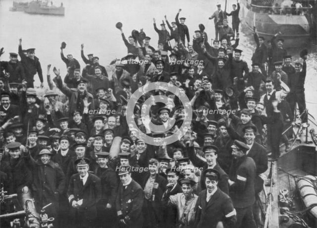 The crew of HMS 'Vindictive' celebrating the Zeebrugge Raid on 23 April 1918. Artist: Unknown