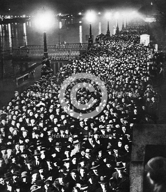 The crowd waiting to pass by King George V's catafalque in Westminster Hall,  London, January 1936. Artist: Unknown
