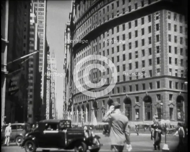 The Crowds Moving Around on a New York City Street, 1930s. Creator: British Pathe Ltd.