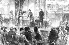 The Duke and Duchess of Connaught at the Royal Albert Orphan Asylum, Bagshot, 1880. Creator: Unknown