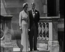The Duke and Duchess of Windsor Standing in the Grounds of the Chateau de Candé, 1937. Creator: British Pathe Ltd