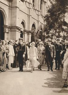 The Duke and Duchess of York and Queen Elizabeth leaving a reception in Brisbane 1927. Creator: Unknown