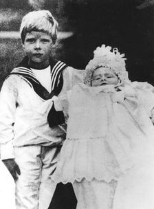The Duke of York with his brother, the Duke of Gloucester, at his christening, 1900