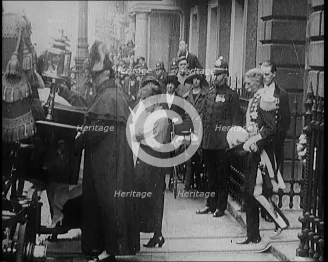 The Duke of York and Lady Elizabeth Bowes-Lyon Emerging from a House and Embarking on a..., 1920. Creator: British Pathe Ltd.
