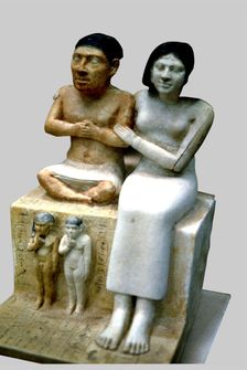 The dwarf Seneb, his wife and two daughters. It comes from Giza