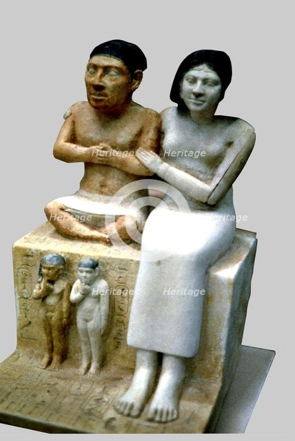 The dwarf Seneb, his wife and two daughters. It comes from Giza.