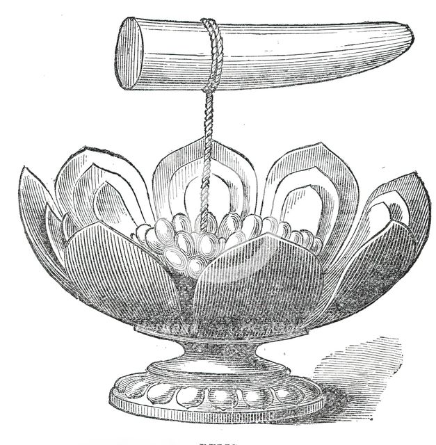 The Dalada, or tooth relic of Buddha, and golden lotus flower in the Maligawa Temple, Kandy..., 1876 Creator: Unknown.