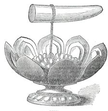 The Dalada, or tooth relic of Buddha, and golden lotus flower in the Maligawa Temple, Kandy..., 1876 Creator: Unknown