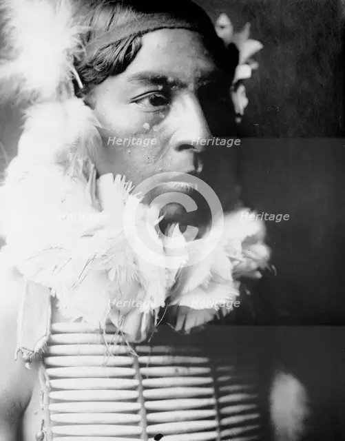 The Dancer, Crow Indian, head-and-shoulders portrait, facing right, c1905. Creator: Edward Sheriff Curtis.