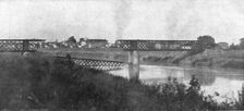 The Dark Hours of Italy; A bridge over the Livenza, which the Italians blew up.., 1917. Creator: Unknown