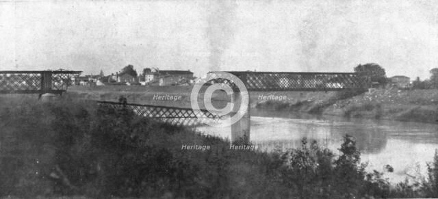 The Dark Hours of Italy; A bridge over the Livenza, which the Italians blew up.., 1917. Creator: Unknown.
