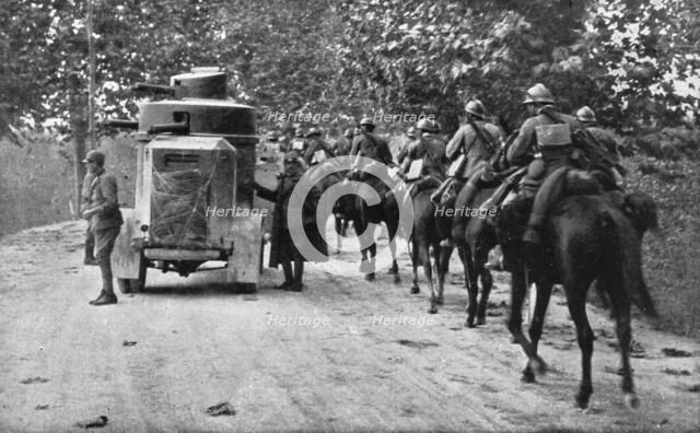 The Dark Hours of Italy; Armored car and cavalry protecting the retreat of a column.., 1917. Creator: Unknown.