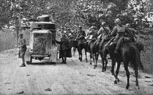 The Dark Hours of Italy; Armored car and cavalry protecting the retreat of a column.., 1917. Creator: Unknown