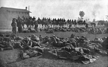 The Dark Hours of Italy; Detachment of infantry, exhausted, resting under protection... 1917. Creator: Unknown