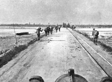 The Dark Hours of Italy; One of the Tagliamento bridges during the retreat..., 1917. Creator: Unknown