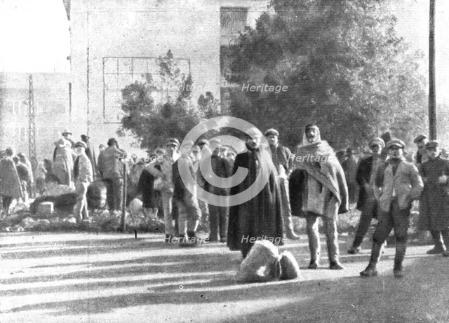 The Dark Hours of Italy; Refugees from Friuli in a square in Brescia, 1917. Creator: Unknown.
