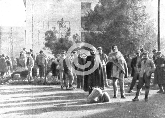 The Dark Hours of Italy; Refugees from Friuli in a square in Brescia, 1917. Creator: Unknown.