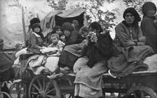 The Dark Hours of Italy; Women and children of Friuli and Carnia fleeing..., 1917. Creator: Unknown