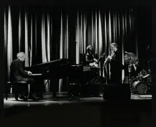 The Dave Brubeck Quartet in concert at the Forum Theatre, Hatfield, Hertfordshire, 10 April 1983. Creator: Denis Williams