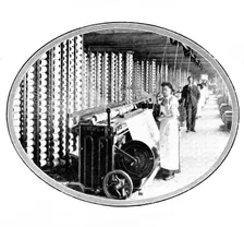 The device that winds the yarn off bobbins to form the warp of the web: warping-frames, 1909. Creator: Unknown