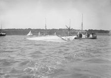 The dismasted sailing yacht Clio is attended to by rescue boats, 1912. Creator: Kirk & Sons of Cowes