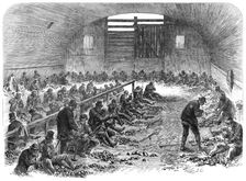 The Distress in East London: the labour-yard of the Bethnal Green Employment Association, 1868. Creator: Unknown